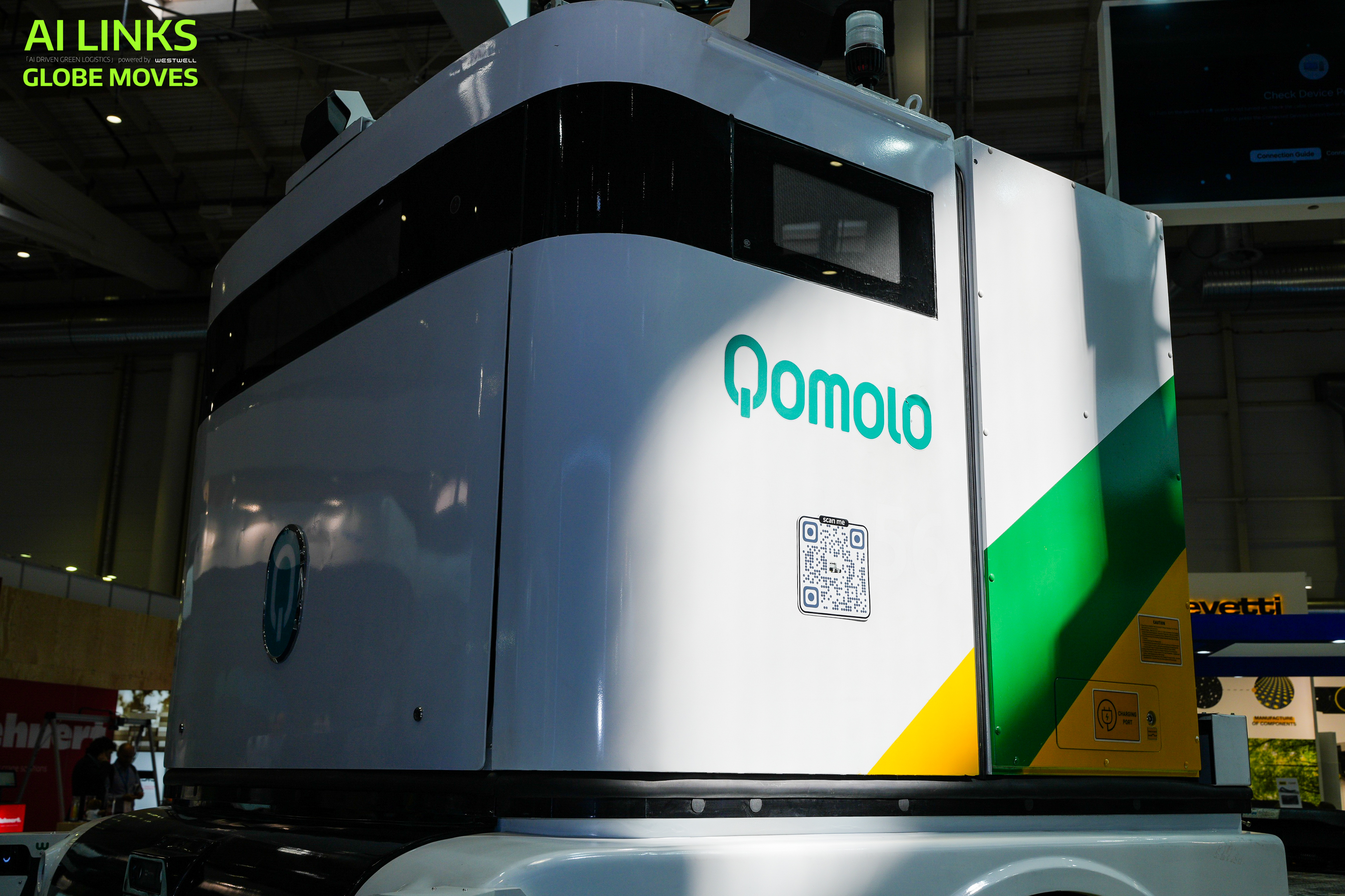Westwell presenting Level 4 autonomous terminal tractors at TOC Europe 2026, demonstrating driverless container transportation in port environments.