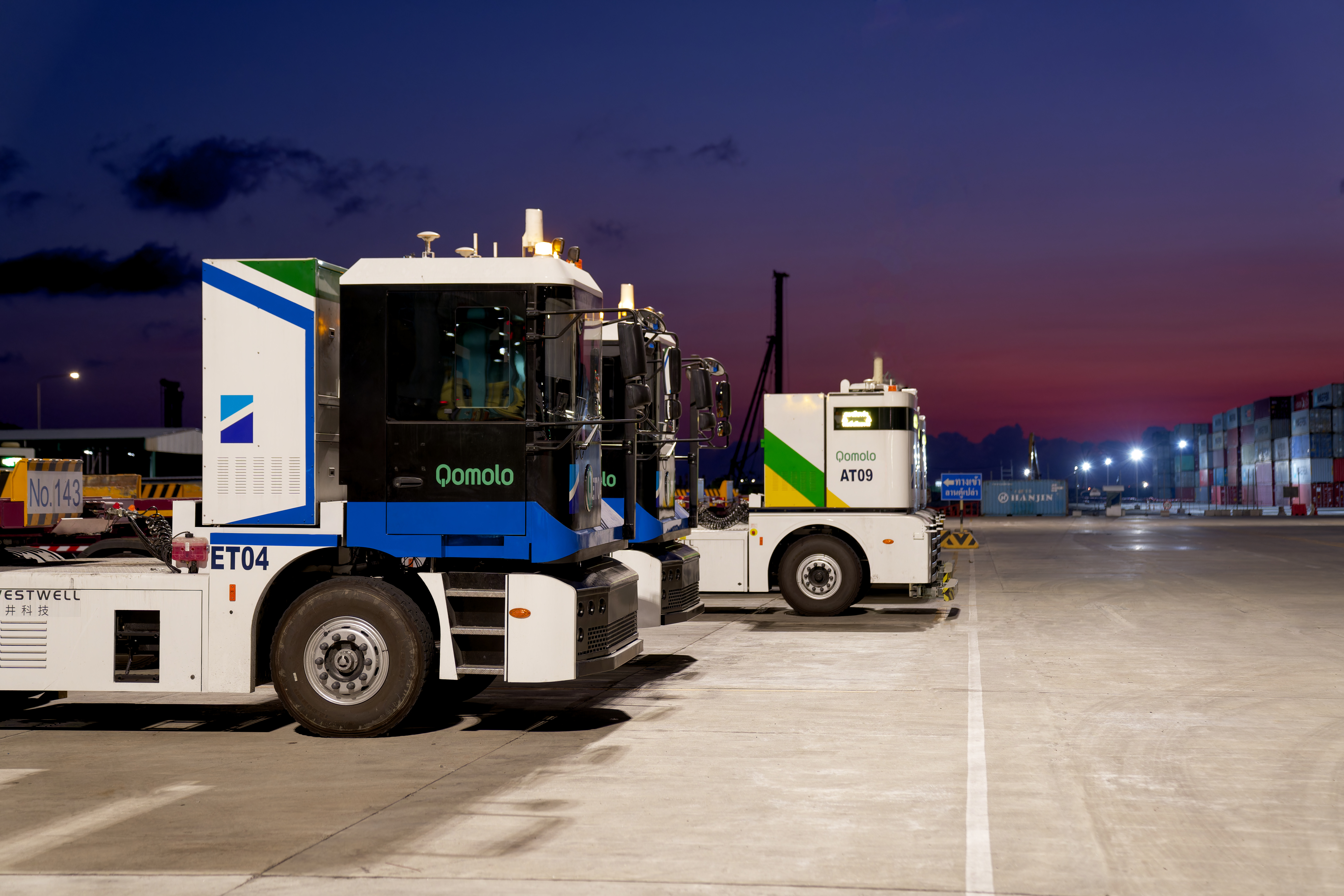Westwell autonomous fleet solution deployed at Laem Chabang Port, Thailand, enabling mixed-traffic operations between manned and driverless terminal tractors.